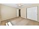 Comfortable bedroom with neutral walls, plush carpeting, and a spacious closet at 524 Concord Ct, Fishers, IN 46038