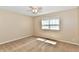 Cozy bedroom with neutral carpeting and a bright window offering natural light at 524 Concord Ct, Fishers, IN 46038