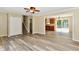 Open-concept living room flows into the kitchen, featuring modern flooring and neutral tones at 524 Concord Ct, Fishers, IN 46038