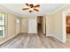 Well-lit living room featuring a closet, staircase, and neutral wall paint at 524 Concord Ct, Fishers, IN 46038