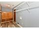 Functional mud room with built-in storage, wooden bench, and practical shelving at 524 Concord Ct, Fishers, IN 46038