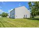 Expansive backyard features lush green grass, perfect for outdoor activities and relaxation at 5652 Apple Branch Way, Indianapolis, IN 46237