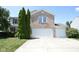 Charming two-story brick home with a two car garage and well-maintained landscaping at 5652 Apple Branch Way, Indianapolis, IN 46237