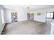 Open living room with neutral walls, carpet, and plenty of natural light at 5652 Apple Branch Way, Indianapolis, IN 46237