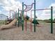 Community playground featuring slides, climbing structures, and a challenging monkey bar set at 6303 Wasco Dr, Whitestown, IN 46075