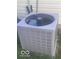 Close-up of gray air conditioning unit placed outside of the house at 6548 Frankenberger Dr, Indianapolis, IN 46237