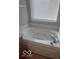 Bathroom boasts a large tub with jets and a big window at 6548 Frankenberger Dr, Indianapolis, IN 46237