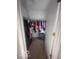 Walk-in closet with hanging clothes and storage shelves, maximizing organization at 6548 Frankenberger Dr, Indianapolis, IN 46237