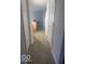Hallway leading to the kitchen with ample storage at 6548 Frankenberger Dr, Indianapolis, IN 46237