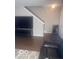 This living room features modern floors, a television, and a neutral color scheme at 6548 Frankenberger Dr, Indianapolis, IN 46237
