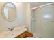 This bathroom features a vanity, mirror, toilet, and shower at 6623 Lakeknoll Dr, Indianapolis, IN 46220