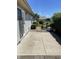 Private back patio with a concrete patio area and mature landscaped yard at 7259 Registry Dr, Indianapolis, IN 46217