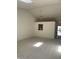 Bright living room with vaulted ceiling and neutral carpet, leading to an entrance at 7259 Registry Dr, Indianapolis, IN 46217