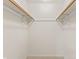 Walk-in closet with shelving and rod for ample storage space at 7384 Southern Lakes Dr, Indianapolis, IN 46237