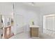 Bright kitchen area featuring a breakfast bar and access to the living and dining areas at 7384 Southern Lakes Dr, Indianapolis, IN 46237