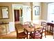 Classic dining space adjacent to the kitchen featuring a chandelier and classic furniture at 7780 Cree Trl, Indianapolis, IN 46250