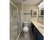 Bathroom with shower, single sink vanity, and a toilet for convenience at 8092 Crystal Ct, Avon, IN 46123