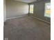 Neutral bedroom with carpet, two windows and base trim around the bottom of the room at 8092 Crystal Ct, Avon, IN 46123