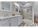 Luxurious bathroom with double vanity, walk-in shower, and modern finishes providing a spa-like experience at 847 E Jefferson St, Franklin, IN 46131