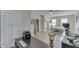 Bright bedroom offers an ensuite bathroom, walk-in closet, and views of the backyard at 847 E Jefferson St, Franklin, IN 46131