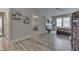 Open bedroom with a bed, game collection, and easy access to another living area at 847 E Jefferson St, Franklin, IN 46131