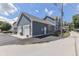 A charming two-story home features an attached two-car garage, creating an aesthetic curb appeal against a bright blue sky at 847 E Jefferson St, Franklin, IN 46131