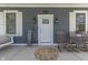 Cozy front porch with swing and rocking chairs, creating a welcoming entrance at 847 E Jefferson St, Franklin, IN 46131