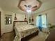 Cozy bedroom featuring a ceiling fan, guitars on the wall, and bright natural light at 8829 Tracy Dr, Clayton, IN 46118