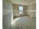 Unfinished bedroom featuring a window that provides abundant natural light to the room at 9417 Crimson Cir, Lapel, IN 46051