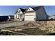 New home with attached garage and covered front porch, situated on a spacious lot at 9417 Crimson Cir, Lapel, IN 46051
