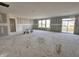 Spacious room with large windows ready for your creativity, with drywall in place and awaiting final touches at 9417 Crimson Cir, Lapel, IN 46051
