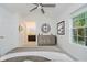 Main bedroom featuring vaulted ceilings and an en suite bathroom at 9689 Exchange St, Fishers, IN 46038
