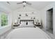 Main bedroom showcasing vaulted ceilings, carpet floors, and built-in shelving at 9689 Exchange St, Fishers, IN 46038