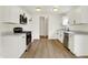 Modern kitchen with stainless steel appliances and white cabinets, blending style and functionality at 10658 Pavilion Dr, Indianapolis, IN 46259