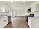 Bright eat-in kitchen with stainless steel appliances and ample counter space perfect for any chef at 10658 Pavilion Dr, Indianapolis, IN 46259