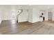 Modern interior with wood floors, staircase, and kitchen area for easy entertaining at 10658 Pavilion Dr, Indianapolis, IN 46259