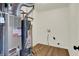 View of the home's utility room with furnace, water heater, and laundry hookups at 10658 Pavilion Dr, Indianapolis, IN 46259