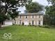 Charming two-story home with stone facade and well-manicured lawn at 10720 Lakeview Dr, Carmel, IN 46033