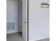 Neutral bedroom featuring a door, tv mount, and an AC unit at 11445 Congaree Way, Indianapolis, IN 46235