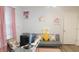 Serene home office space with a comfortable gray futon and stylish decor at 11445 Congaree Way, Indianapolis, IN 46235