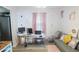 Inviting home office with a stylish desk setup, comfortable seating, and bright natural light at 11445 Congaree Way, Indianapolis, IN 46235