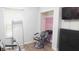 This salon room features salon chairs, a hair washing station, and neutral-toned walls at 11445 Congaree Way, Indianapolis, IN 46235
