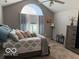 Cozy bedroom featuring vaulted ceilings and a window allowing natural light at 11503 Winding Wood Dr, Indianapolis, IN 46235