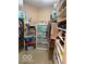 Walk-in closet with shelving for optimal storage and organization at 11503 Winding Wood Dr, Indianapolis, IN 46235