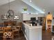 Modern kitchen featuring white cabinets, stainless steel appliances, and an open design at 11503 Winding Wood Dr, Indianapolis, IN 46235