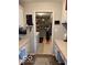 Laundry area featuring modern appliances and plenty of counter space at 11503 Winding Wood Dr, Indianapolis, IN 46235