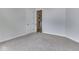 Bedroom featuring plush carpeting and doors leading to an en-suite bathroom at 3270 Cherokee Cir, Bargersville, IN 46106