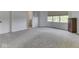 Bedroom featuring gray carpet, a closet and a window with outside views at 3270 Cherokee Cir, Bargersville, IN 46106