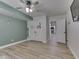 Bedroom featuring modern laminate flooring and an open doorway to a hallway at 3270 Cherokee Cir, Bargersville, IN 46106