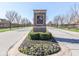 The Somerset community entrance features a brick monument, colorful flowers, and manicured landscaping at 3270 Cherokee Cir, Bargersville, IN 46106